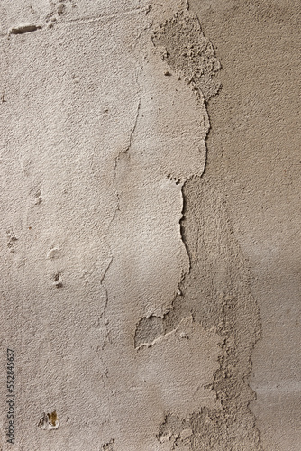 The surface is roughly decorated with cement mortar. Texture. Close-up