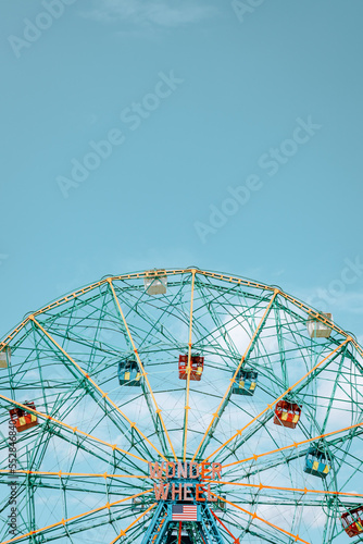 View from the Coney Island boardwalk of the iconic amusement park Wonder Wheel photo