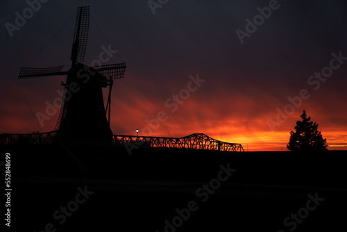 Windmill and Bridge with a Fire Sunset