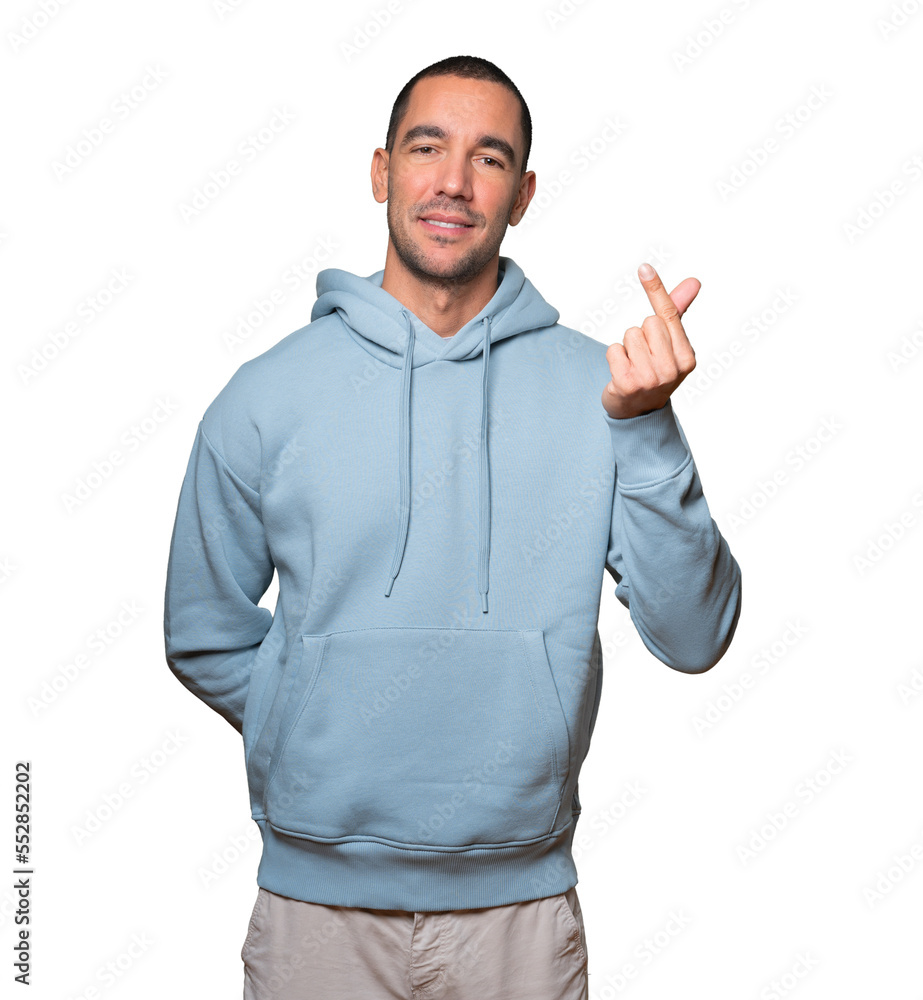 Young man making a gesture of worried about his economy Young man making a gesture of worried about his economy