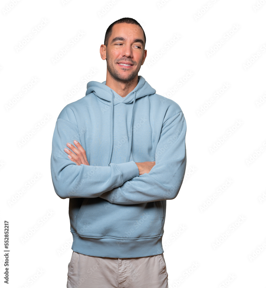 Satisfied young man with crossed arms gesture Satisfied young man with crossed arms gesture