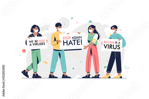 Stop Asian Hate‬‬. Racism is a Virus. China protest. Hashtag to support asian community during the covid-19 pandemic. People wearing face mask and holding banner.