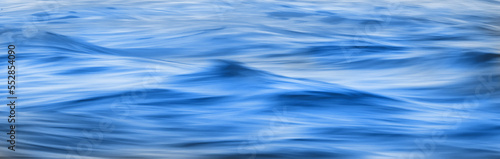 soft blur moving water wave, close up water background