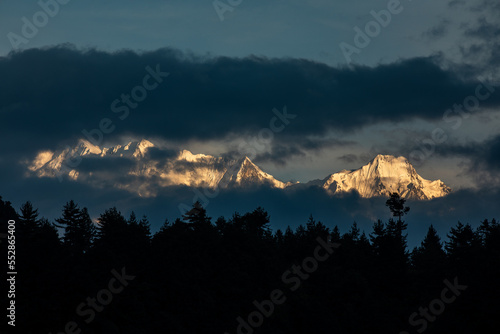 Sunrise and sunset on snow mountains throughout Tibet