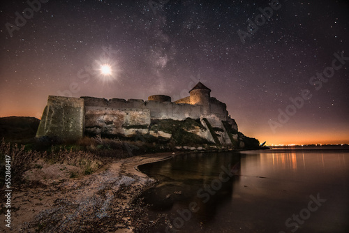 Night castle - stars and moon sky. Ukraine, Odessa region- Belgorod-Dniester fortress up to 1944 - Akkerman - a monument to the history of urban planning and XIII-XV centuries