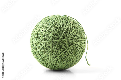 Green big cotton thread ball isolated on white background. Knitting ball of cotton string..