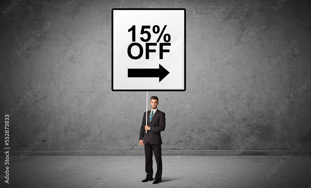business person holding a traffic sign concept business person holding a traffic sign concept