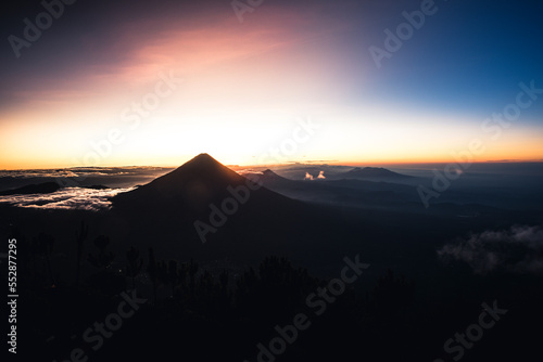 Sunrise behind volcano Agua in Guatemala photo