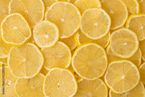 Lemon slices background. Sliced lemon.