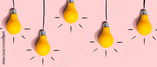 Hanging idea light bulbs - Business concept - Flat lay