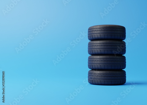 Stack of car tires on a blue background. Concept of changing tires for seasonal, using tires on snow, ice. Replacing tires with summer or winter. 3D render 3D illustration © Andrii