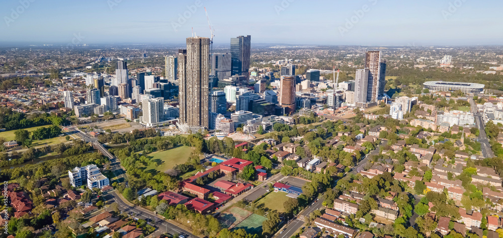 Naklejka premium Panoramic aerial drone view of Parramatta CBD in Greater Western Sydney, NSW, Australia showing development of the city as at December 2022