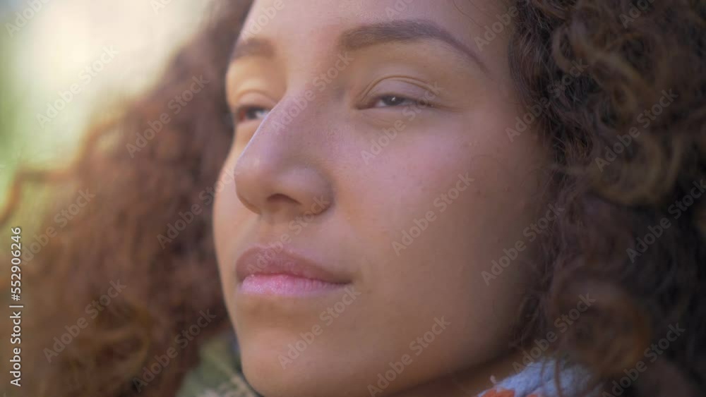 beautiful face of thoughtful girl who looks at the sky and smiles heartily beautiful face of thoughtful girl who looks at the sky and smiles heartily