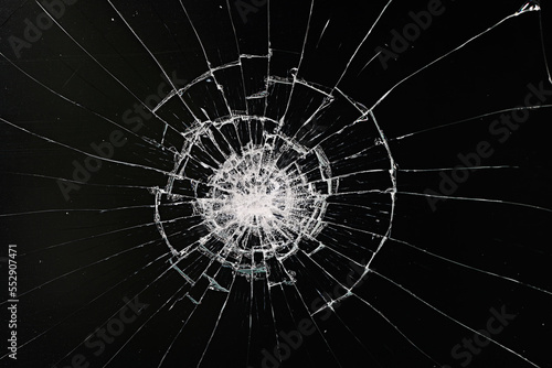 Foto cracks on the glass impact on the glass, abstract background broken window damag