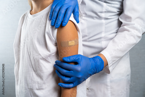 vaccination of children, a little boy at a doctor's appointment, children's medicine, injection in the hand, close-up photo