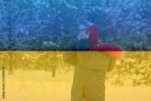 Defocus cold winter in Ukraine. The concept of the energy crisis and the increasing demand for electricity. Ukraine flag snow holiday. Out of focus