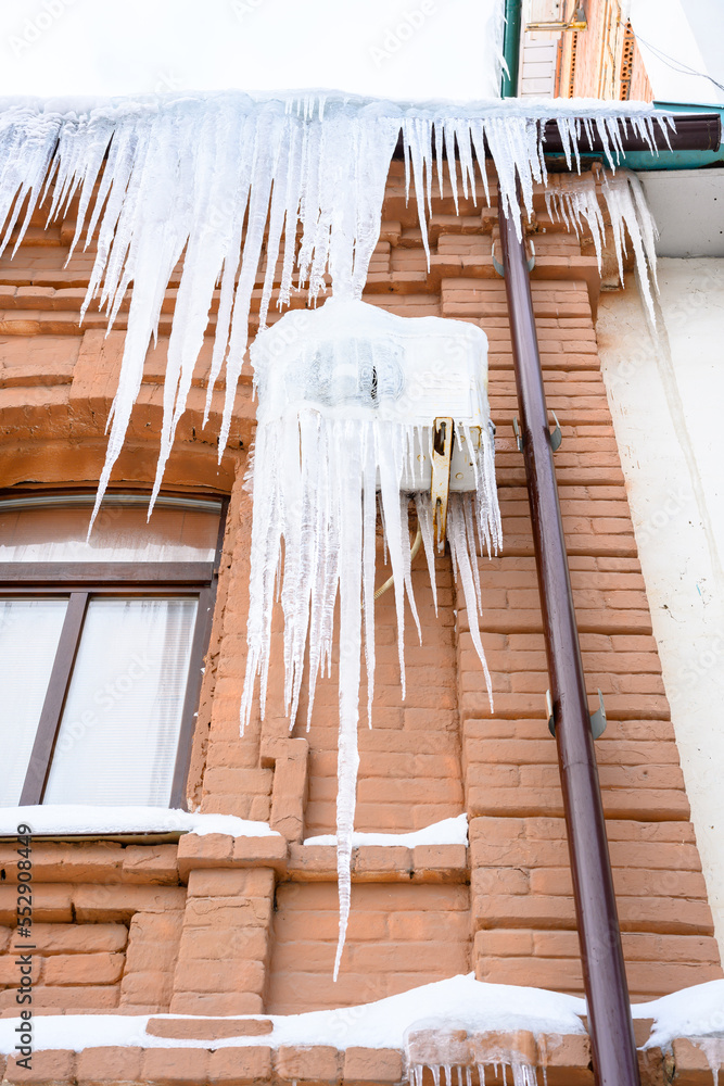 Close-up of icicles on the roof. Close-up of icicles on the roof.