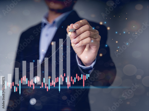Investors' growth charts and investment analysis concepts of business growth, profit, development, and success Financial market graph presentation about stock market developments and profits.