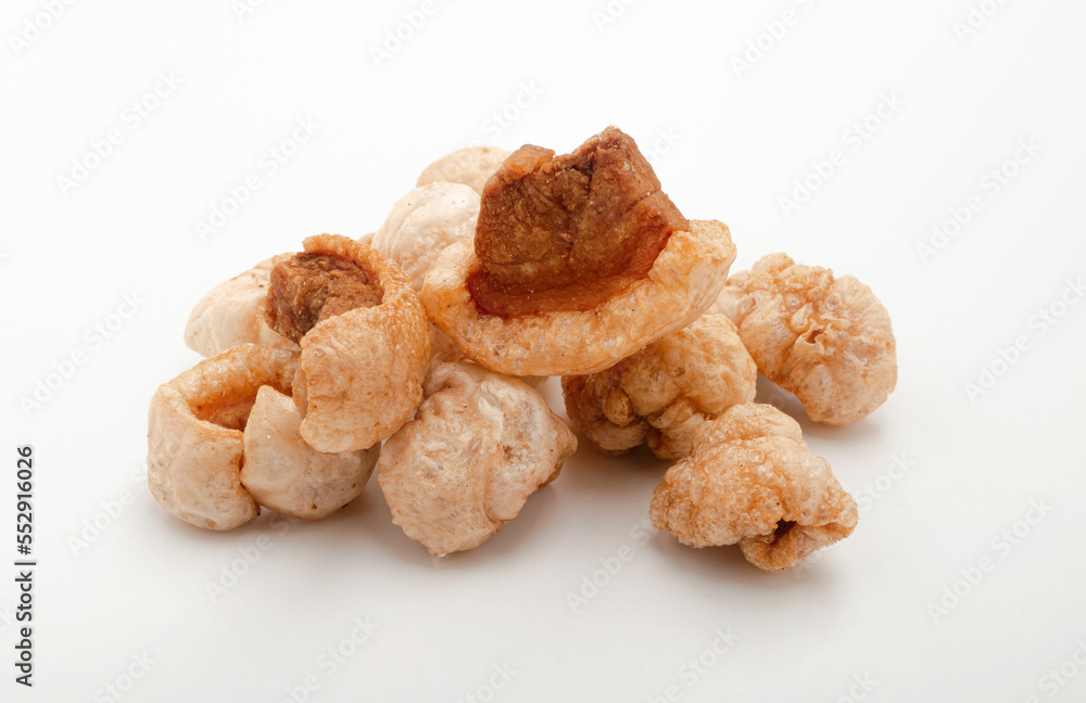Crispy sliced pork skin snack food isolated on white background Crispy sliced pork skin snack food isolated on white background