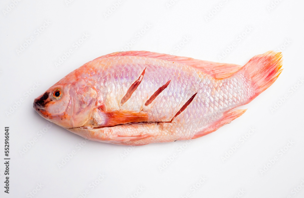 fresh red pomegranate fish on a white background fresh red pomegranate fish on a white background