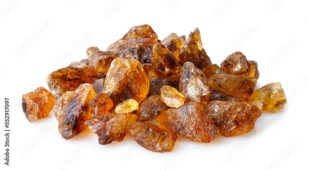 heap of brown caramelized sugar isolated on white