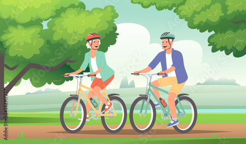 Happy elderly couple ride bicycle. Seniors on an active holiday. Grandparents in helmets ride sports bikes outside