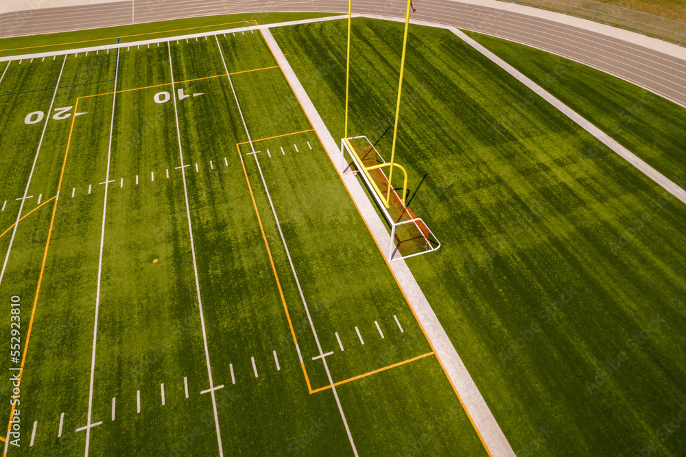 Soccer field grass view. Football field with green grass and white