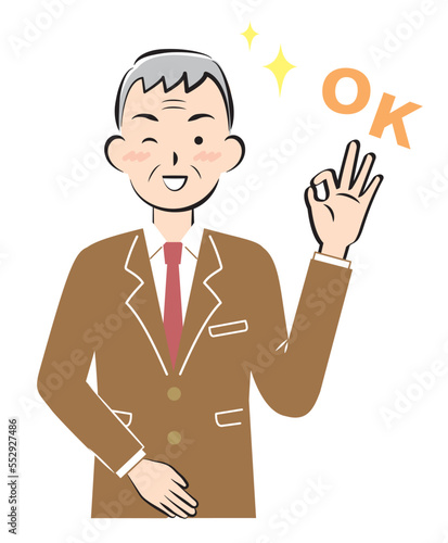 OKサインを出すスーツ姿のシニア男性