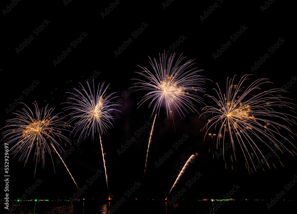 Firework display on isolated black background at Pattaya City. 