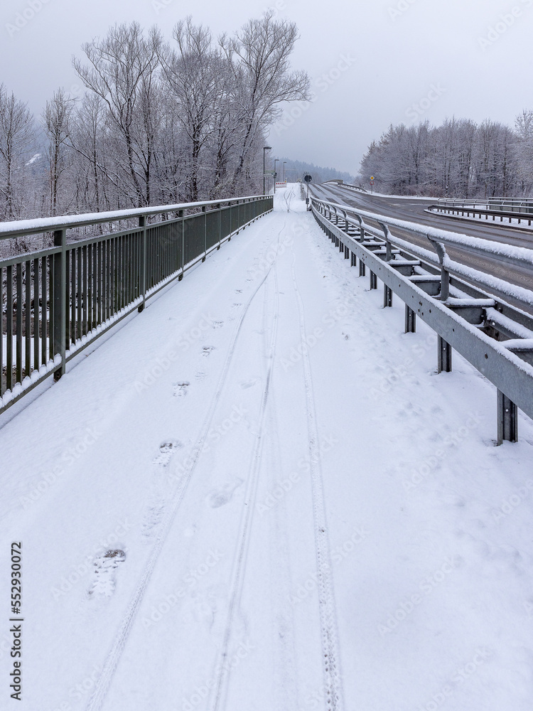 snow covered bridge in winter snow covered bridge in winter