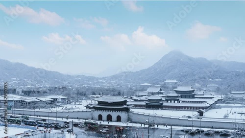 High angle view of snowfall in front of Gyeongbukgung Palace, winter in South Korea.Time lapse photo