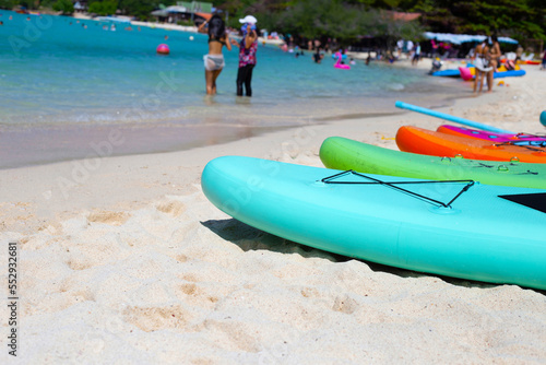 Wallpaper Mural Sup board on the beach. Tourists on Tien beach, Koh Larn Pattaya, Thailand. Torontodigital.ca