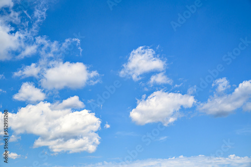 White clouds in a bright blue sky. The beauty of the nature