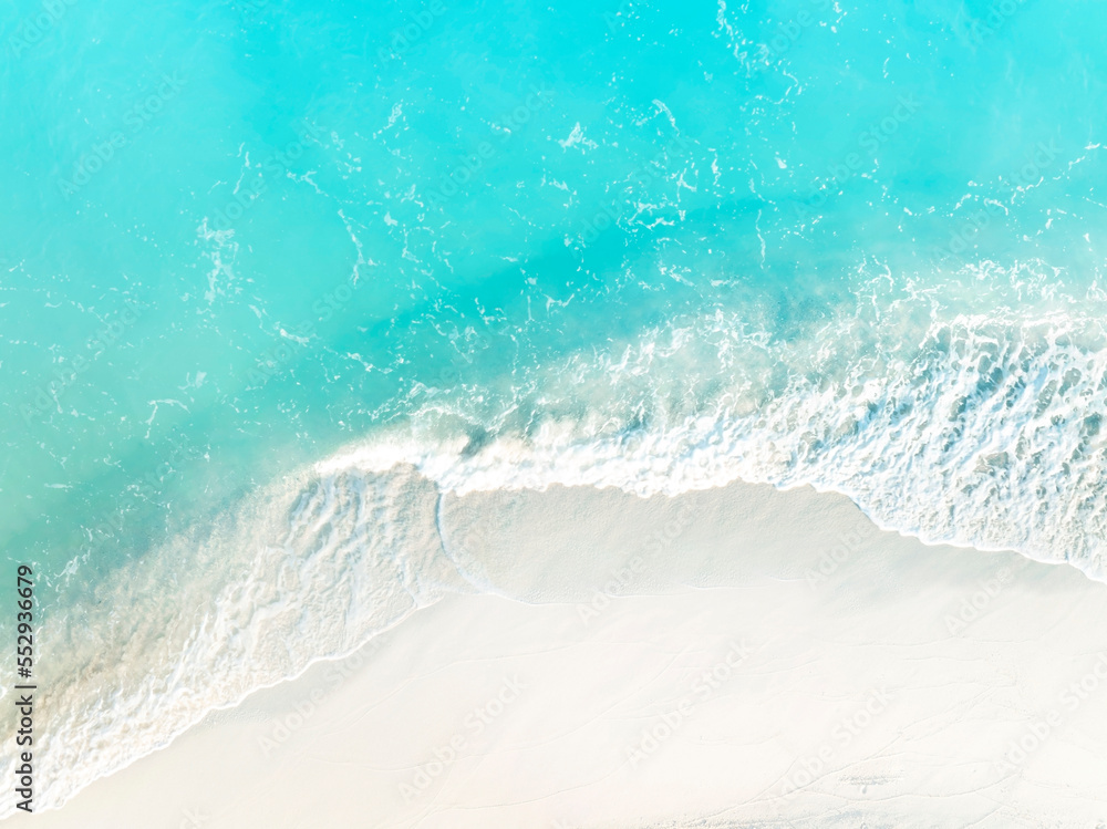 White sand beach with wave water in the seashore as ecology background