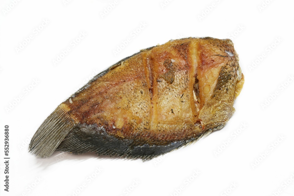 Crispy fried fish on a white background Crispy fried fish on a white background