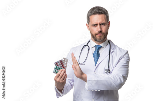 contraindication to pills. man with contraindication gesture.