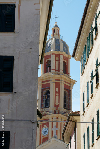 Bell tower of the basilica of Sts. Gervasius and Protasius in Rapallo . Liguria, Italy photo