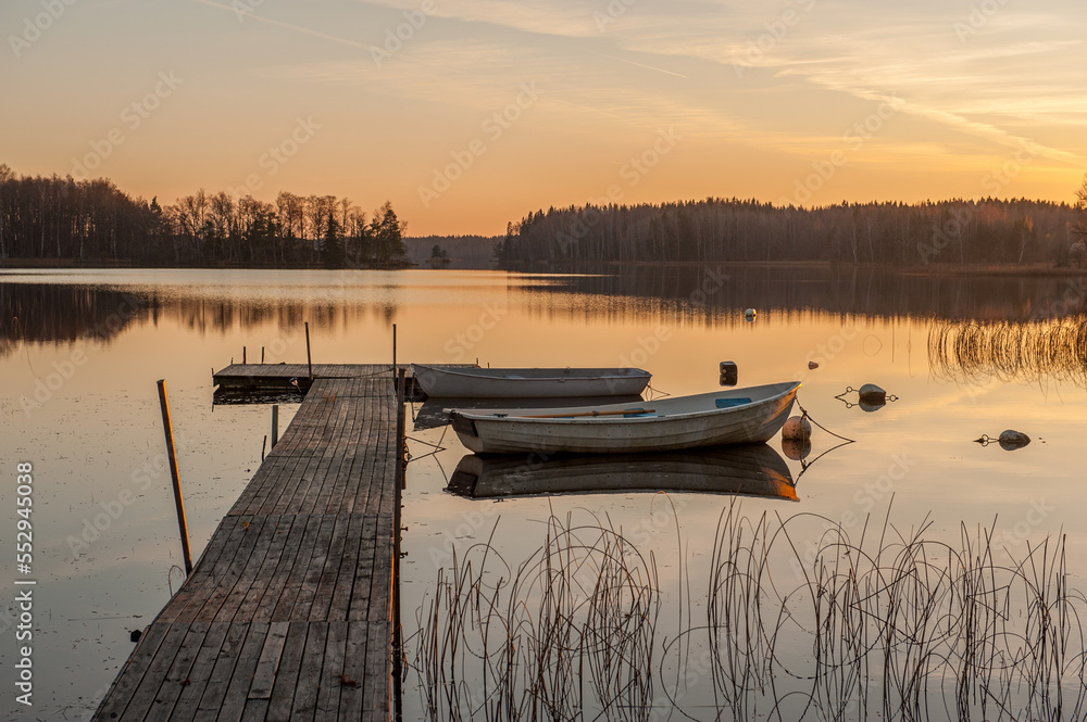 Sunrise on a November morning at lake Annsjön in county Östergötland, Sweden Sunrise on a November morning at lake Annsjön in county Östergötland, Sweden