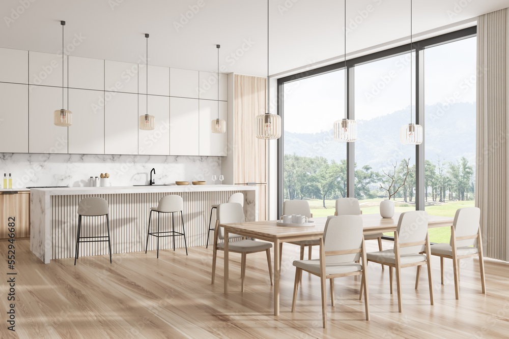 Fototapeta premium Corner view on bright kitchen room interior with dining table