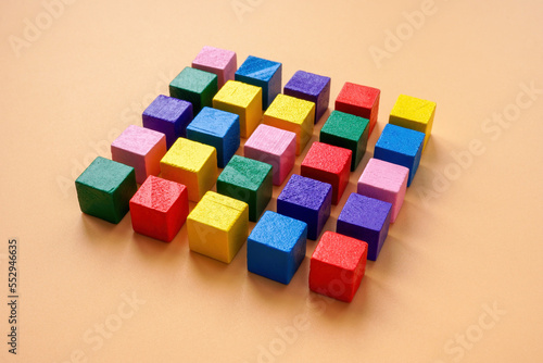 A square of multi-colored cubes as a symbol of order and company management.
