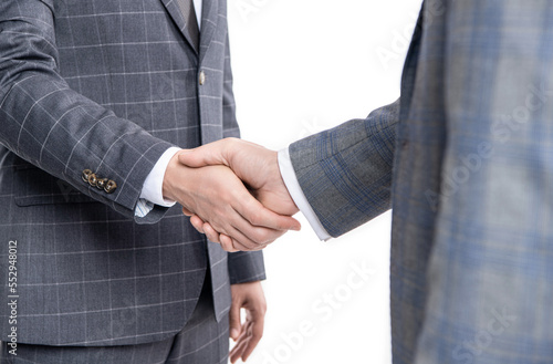 two hands dealing business partnership. partnership of business men handshaking isolated on white