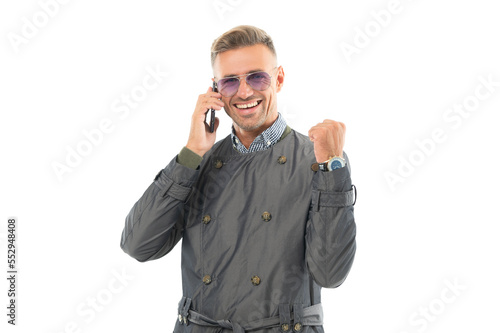Happy smiling successful business man businessman ceo having phone conversation on mobile phone