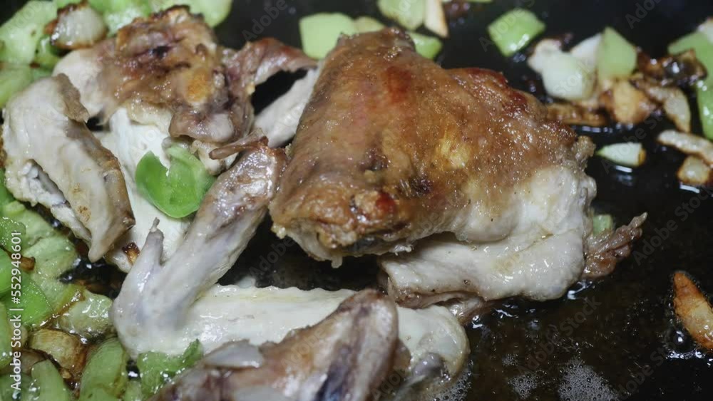 fried appetizing wings with a crust with onions and vegetable peppers, macro
fried appetizing wings with a crust with onions and vegetable peppers, macro