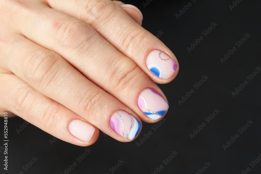 female manicure on a black background. nail. nails. Women's hands with a beautiful manicure on a black background. Beautiful female hands on a dark background. Take care of your hand. female manicure on a black background. nail. nails. Women's hands with a beautiful manicure on a black background. Beautiful female hands on a dark background. Take care of your hand.