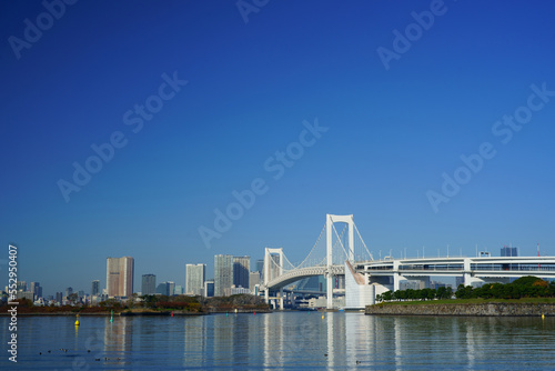 Rainbow bridge with city skyline in Tokyo 