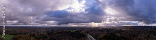 Panoramic from Limoges North with speedway and sunrays through the clouds, Limoges, France 
