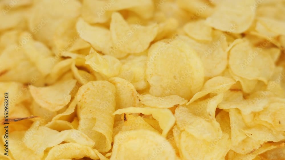 Potatoes chips pour and rotation Potatoes chips pour and rotation