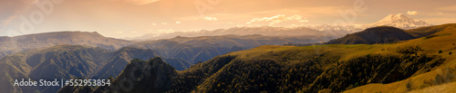 The most beautiful mountain slopes of the North Caucasus. Mountain landscapes of the Elbrus region, Kabardino-Balkaria. Russian Federation. Sunset in the mountains, panoramic view.  © Adsloboda