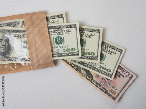 money american dollars in a brown envelope concept bribe corruption