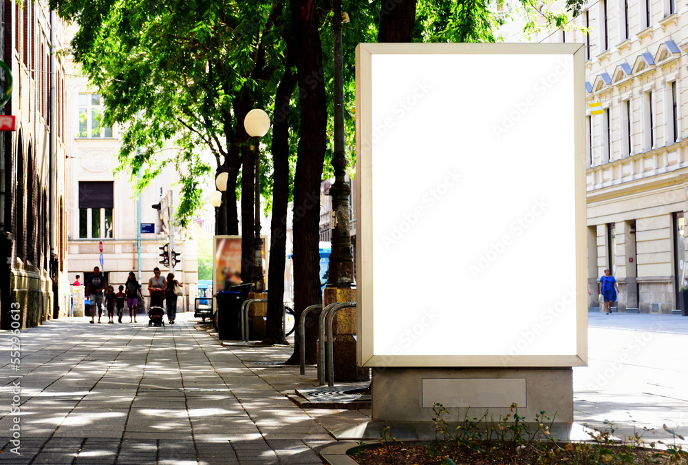 billboard at busstop. blank white poster and advertiser ad space. outdoor display lightbox. base for mockup. empty display panel. glass design. soft streetscape in urban outdoor background - obrazy, fototapety, plakaty 